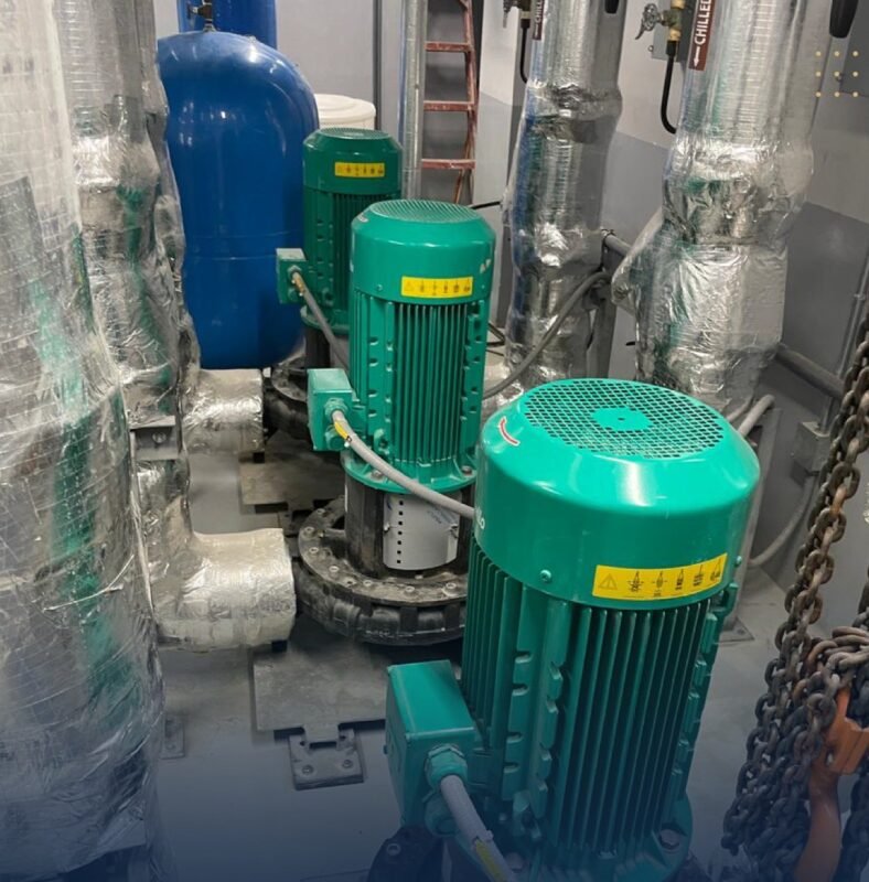 Vertical in-line chilled water circulation pumps and insulated pipework installed by IBS in the plant room of the Hilton Garden Inn, Riyadh